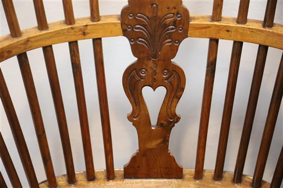 An early 19th century yew, ash and elm Windsor chair, W.2ft D.1ft 9in. H.3ft 5in.